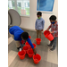 three boys playing with buckets